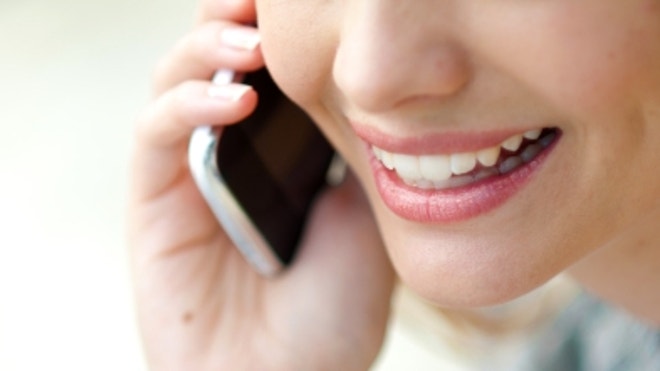 Woman Talks on Cellphone.JPG